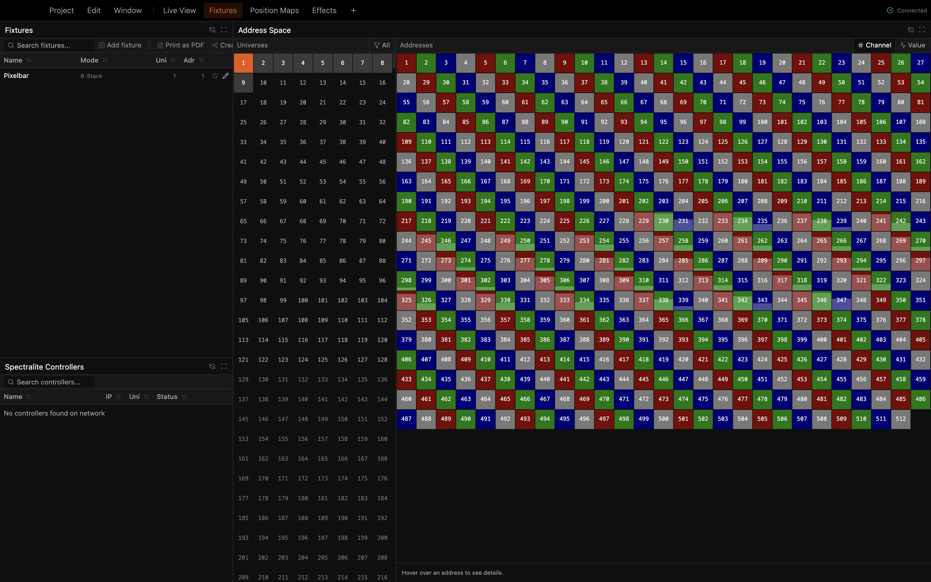 The Fixtures workspace with a patched pixelbar rig and the Address Space grid